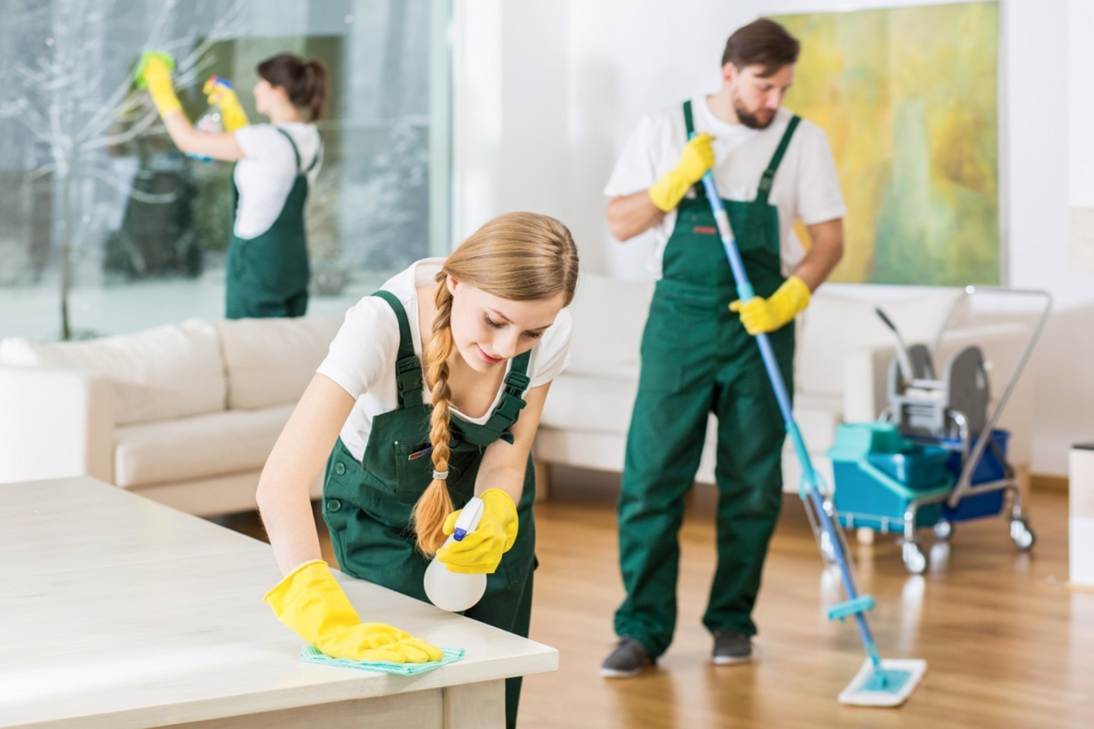 Woman vacuum cleaning floor